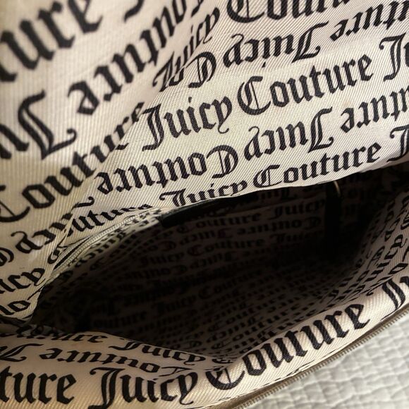 A Juicy Couture tan And Black Medium Backpack With Crown And Key. Fold Over Top - Picture 8 of 13